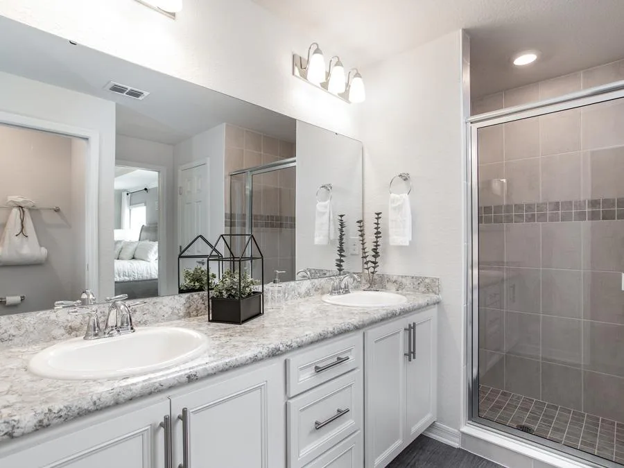 En-suite owner's bath in the Raychel model home in St. Cloud, FL