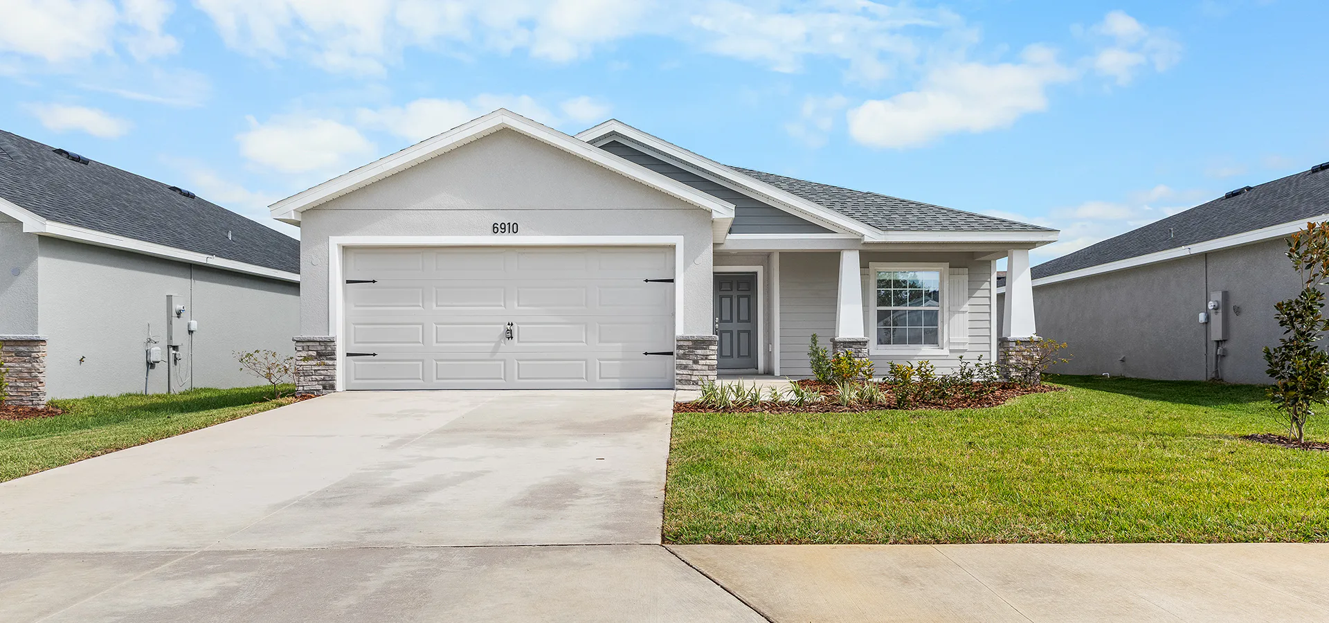 Craftsman style exterior of a new home by Highland Homes in Ocala