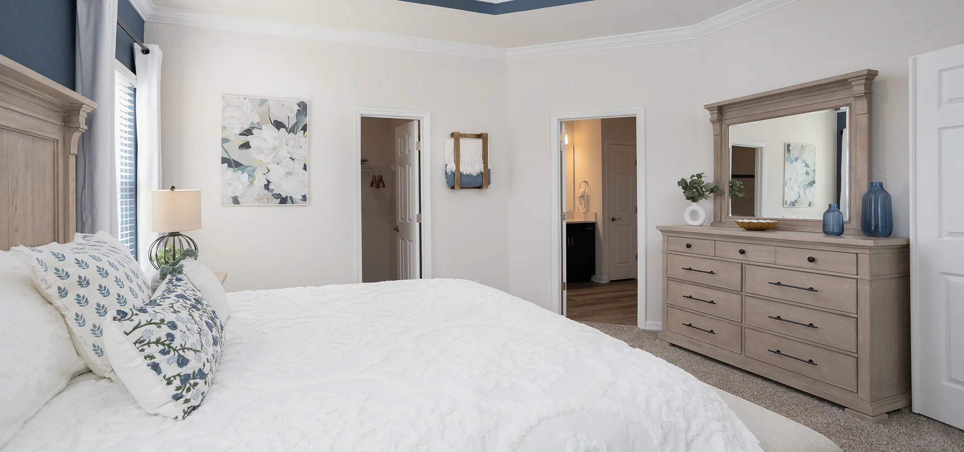 Large owner's bedroom suite in Highland Homes' St. Cloud model home